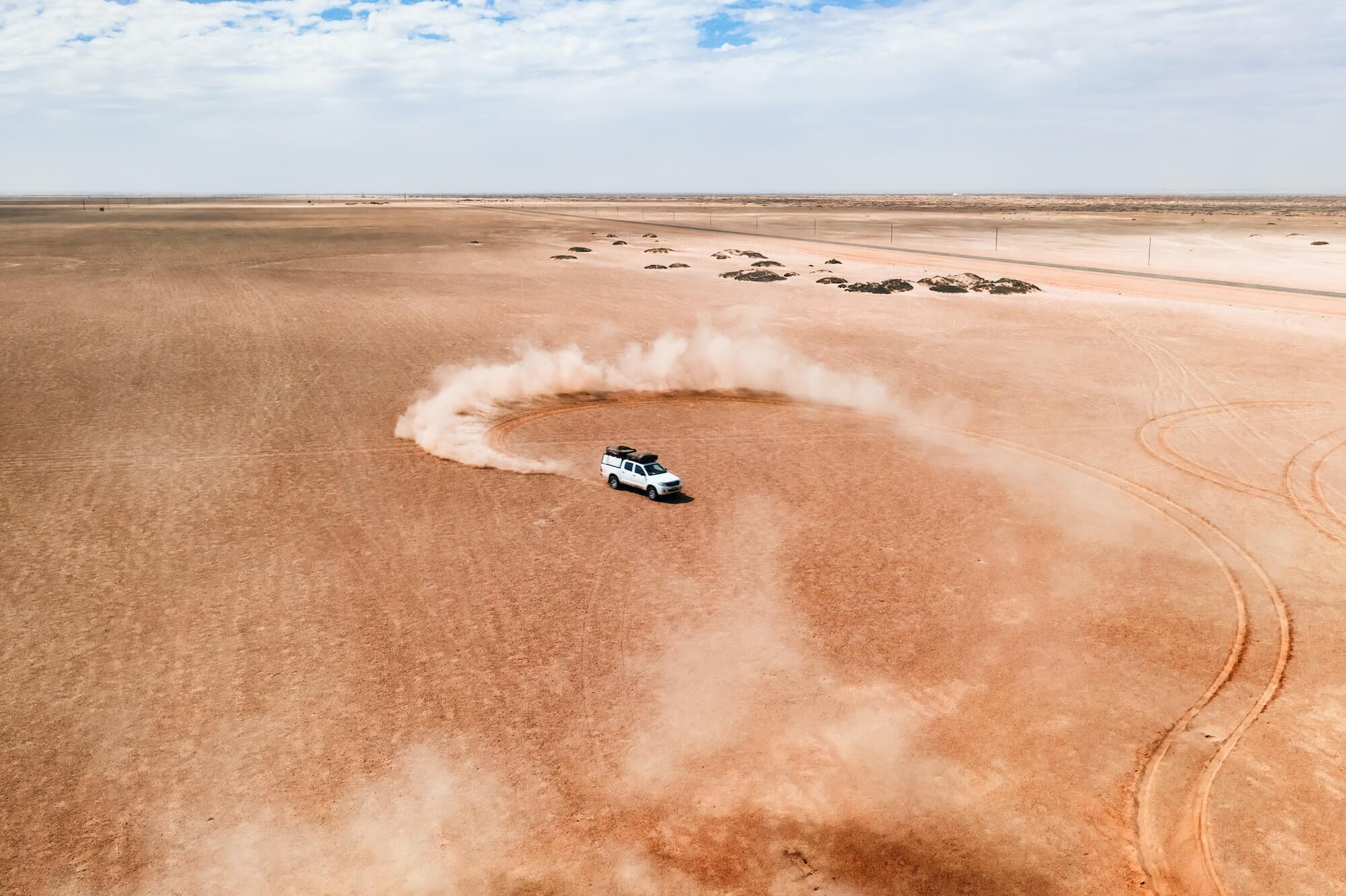 a-white-suv-car-dune-drifting-in-desert-1.jpg a-white-suv-car-dune-drifting-in-desert-1.jpg